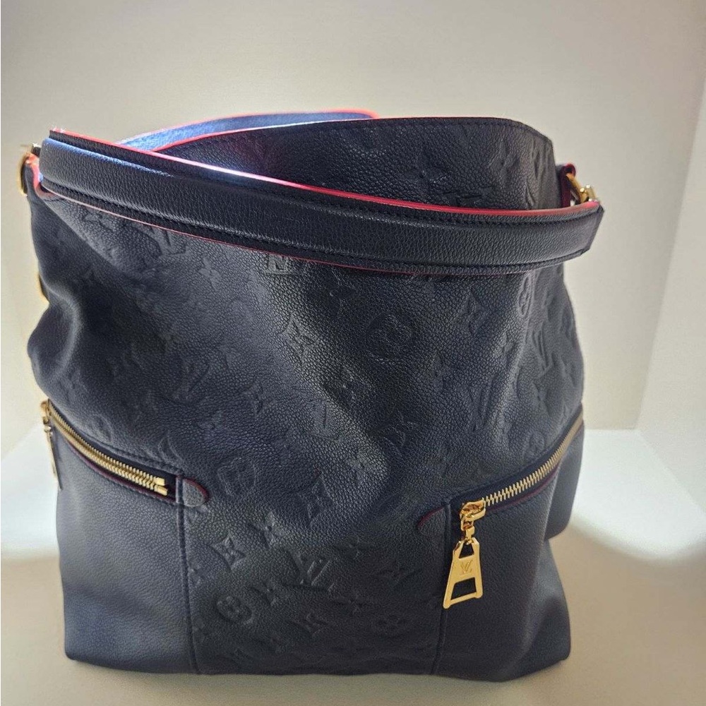 Blue empriente leather bag. Hobo style. Discontinued on the website.